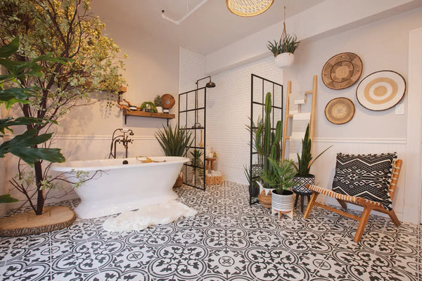 A bohemian style bathroom featuring an eclectic mix of tile patterns and textures in earthy hues
