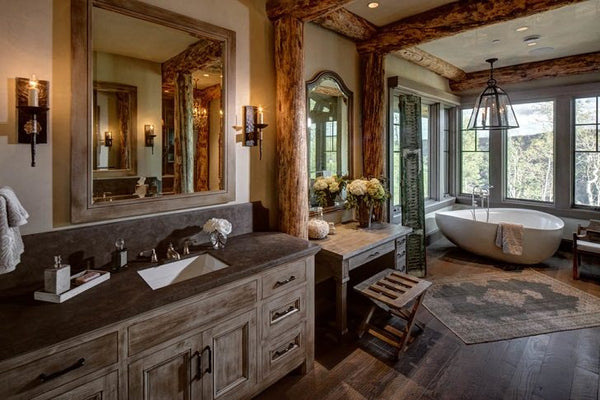 Rustic Charm in the Bathroom: A Cozy & Inviting Space with Exposed Wood Beams and a Freestanding Bathtub. Enhance your bathroom's natural beauty with our store's high-quality rustic tiles, perfect for creating an inviting and cozy space.
